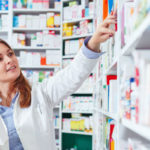 Photo 20of 20a 20professional 20pharmacist 20checking 20stock 20in 20an 20aisle 20of 20a 20local 20drugstore 202