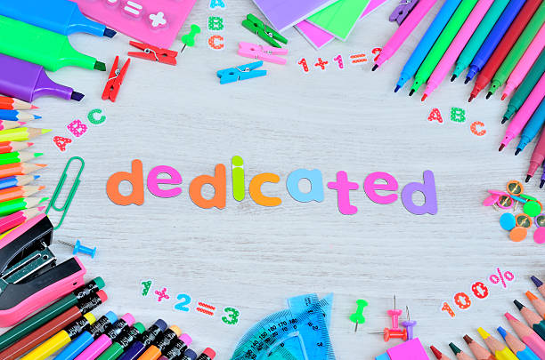 Word Dedicated Colors Letters And Objects For School On Gray Wooden Table