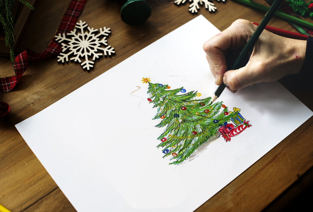 A Person Drawing A Colorful Santa Claus' Face