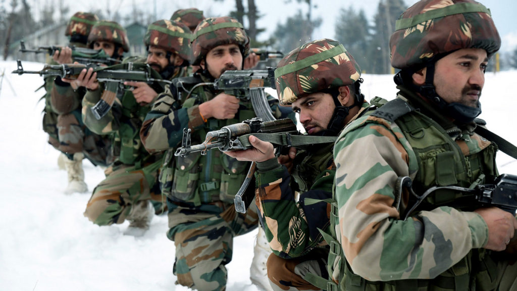 Army Jawans Patrolling Near The Snow Covered Border